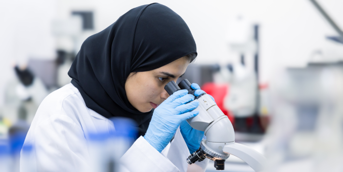 Researcher conducting laboratory analysis at the Zayed Bin Sultan Center for Health Sciences, UAEU.